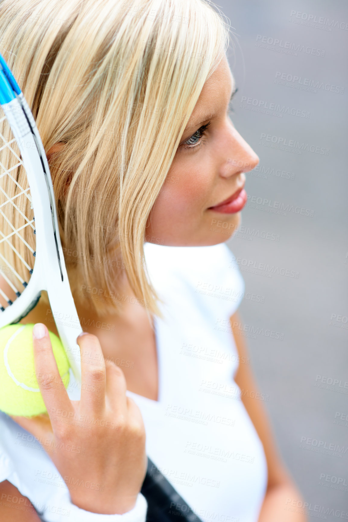 Buy stock photo A young female tennis player with her racquet and ball in her hand