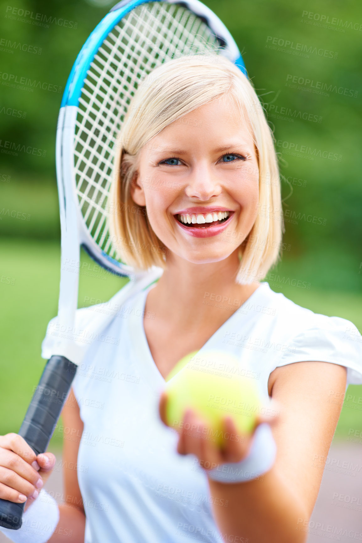 Buy stock photo Portrait of a young female tennis player holding her racquet and offering you the ball