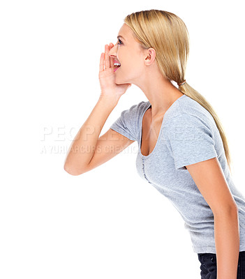 Buy stock photo Studio shot of a young woman shouting against a white background