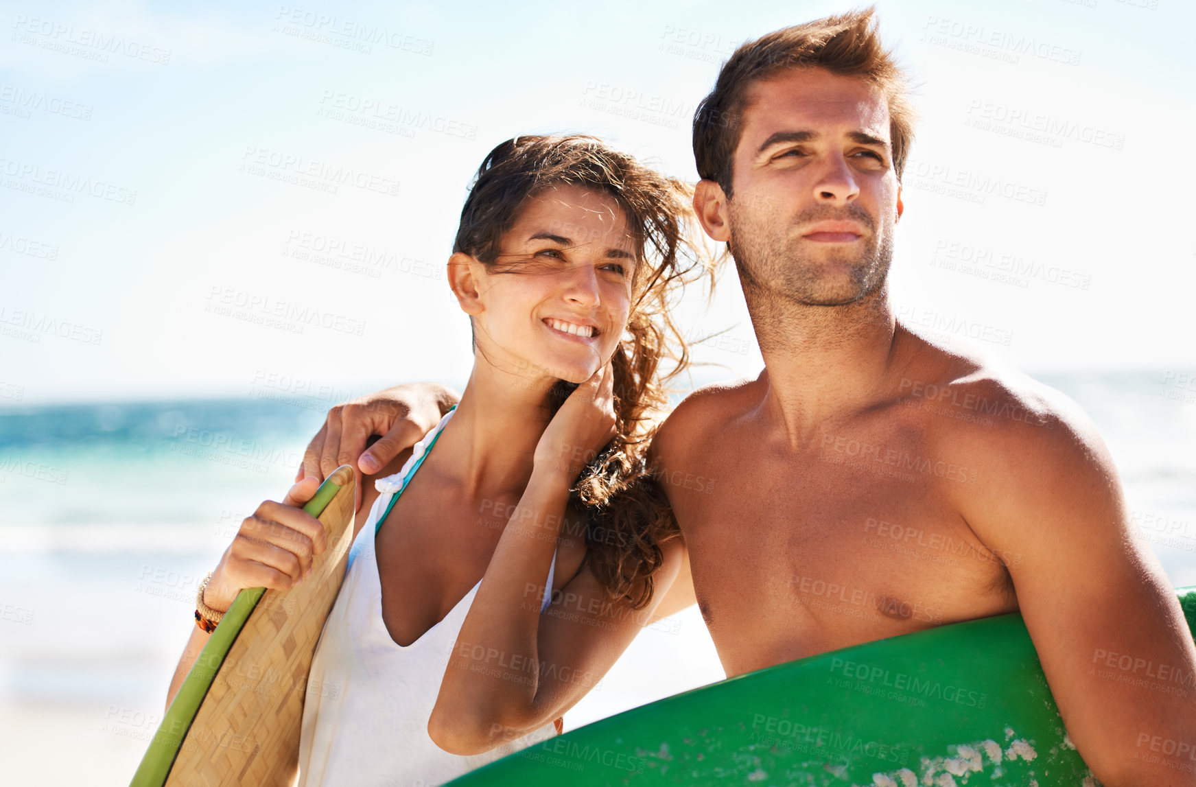 Buy stock photo Couple, beach and surf, holiday and travel with summer and bonding outdoor, sport and people on a date. Ocean, wind and view with surfing, man and woman in relationship, fun activity and adventure