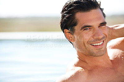 Buy stock photo Pool, rooftop and portrait of man swimming outdoor for travel, freedom or summer holiday at resort. Relax, smile and face of male swimmer in nature for luxury getaway at villa, spa or hotel vacation