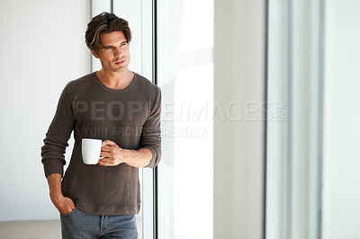 Buy stock photo Coffee, thinking and young man at apartment with memory, vision or reflection face expression. Handsome, morning and male person from Canada with latte, cappuccino or espresso with an idea at home.