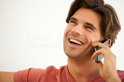Buy stock photo Happy, man and thinking in home with phone call, mobile contact and digital communication with mockup space. Face, laughing and talking on smartphone for chat, funny conversation and tech connection 