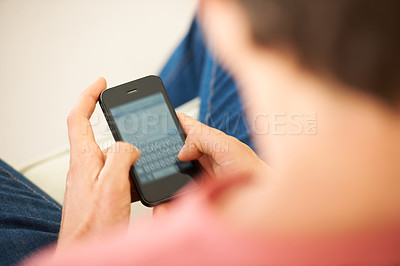 Buy stock photo Phone, hands and closeup of man networking on social media, mobile app or the internet. Technology, cellphone and male person typing a text message or scroll on website for entertainment at home.