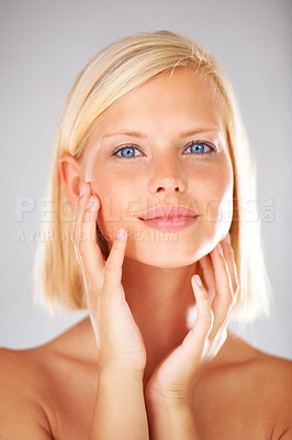 Buy stock photo Cosmetics, studio portrait and woman feeling, touch or check smooth skin texture, collagen filler results or skincare treatment. Dermatology self care, anti aging headshot or girl on white background