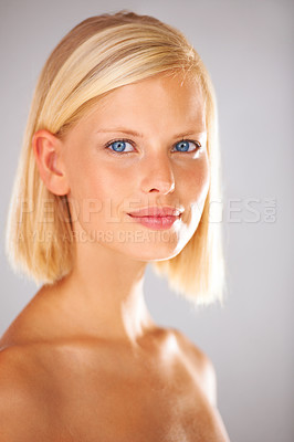 Buy stock photo Portrait, beauty or woman with cosmetics, self care or dermatology on a grey studio background. Face, happy person or model with luxury, healthy skin or grooming with aesthetic, treatment or skincare