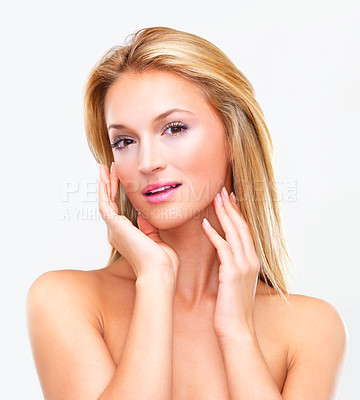 Buy stock photo Beauty, shampoo and hair with a natural woman in studio on a white background for luxury or keratin treatment. Face, makeup and haircare with a confident young model touching her skin at the salon