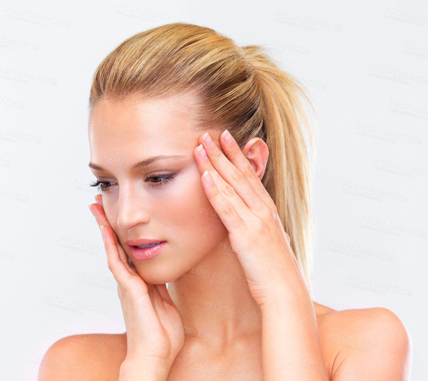 Buy stock photo Face, beauty and hands of a woman closeup in studio on a white background for natural wellness or cosmetics. Skincare, cosmetics or foundation with a confident young model at the salon for antiaging