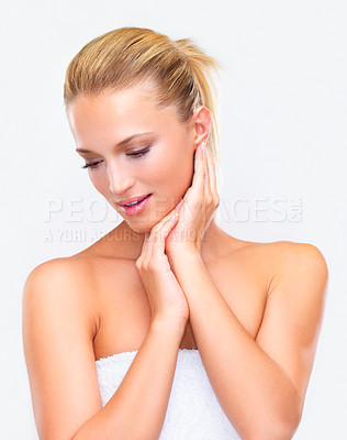 Buy stock photo Spa, beauty and cleaning with a woman in a towel in studio on a white background for natural wellness or cosmetics. Body, skincare or hygiene with a fresh young model after shower for dermatology