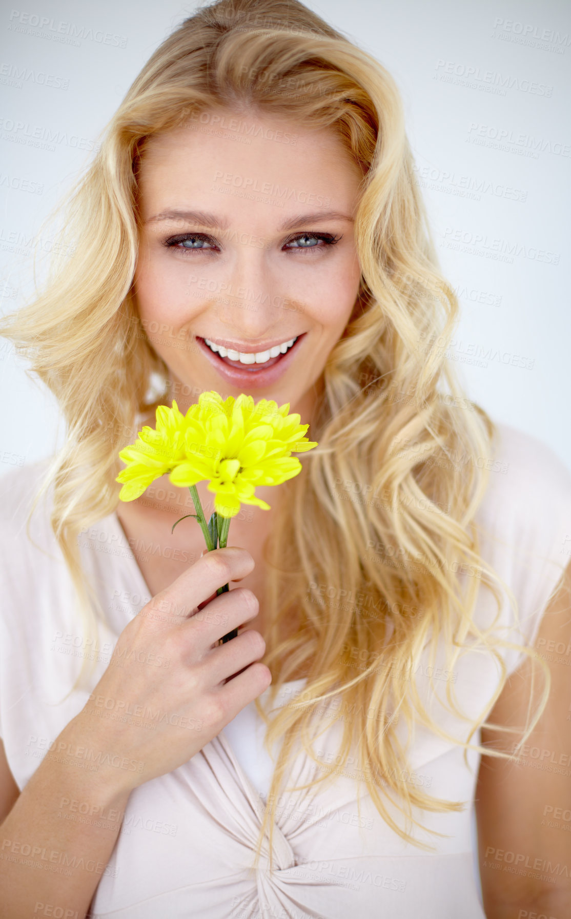 Buy stock photo Portrait of happy woman, daisy and flowers in studio, isolated and white background. Female model smile with yellow plant, petals and fresh blossom for happiness, sustainability and floral beauty 
