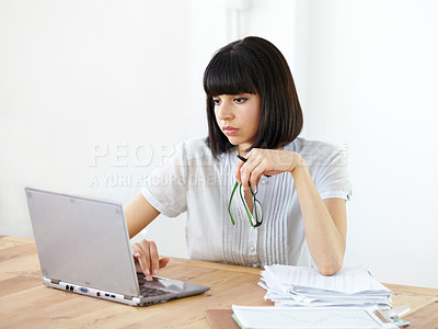 Buy stock photo Business, focus and woman with a laptop, digital planning or online reading at the workplace. Female person, employee or confident consultant with technology, search for information or update website