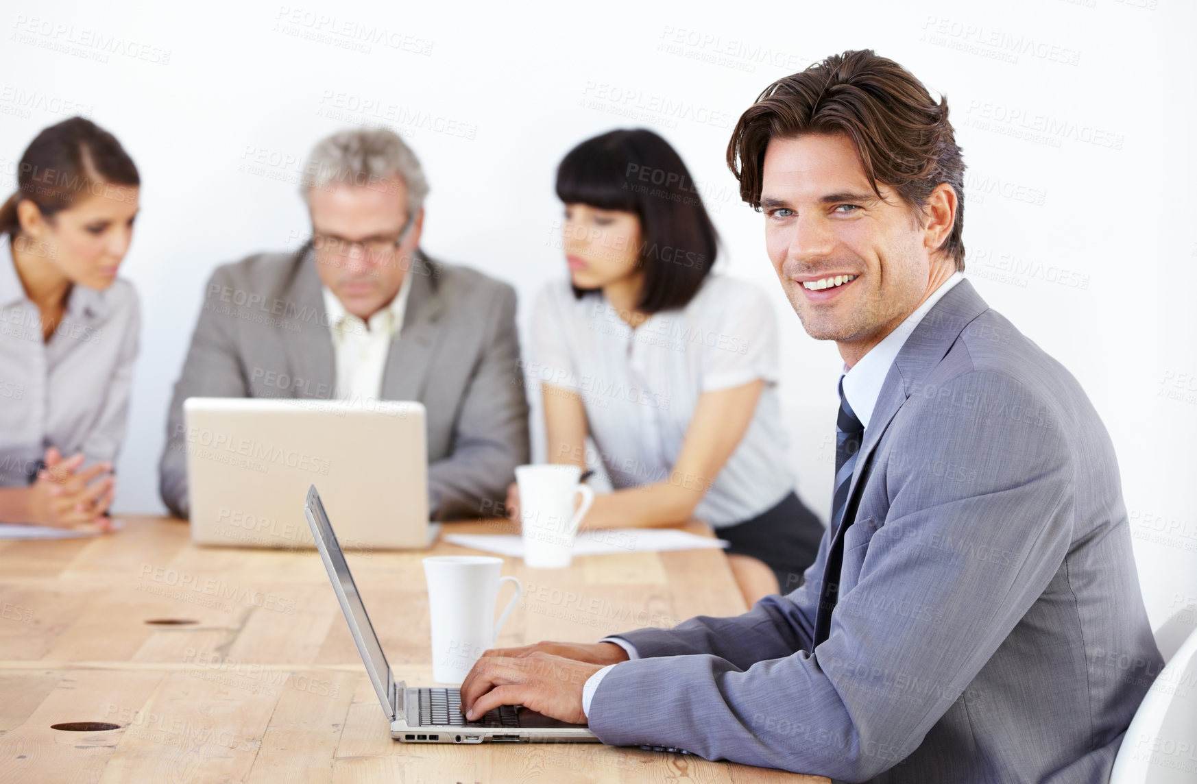 Buy stock photo Business man in portrait, typing on laptop in meeting and corporate leader in conference room. Leadership, male person with smile and planning with technology in workplace, confidence and pride