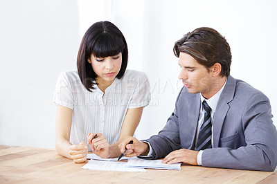 Buy stock photo Business people, analysis of paperwork in meeting, team in office conference room and collaboration. Data analyst employees working together, man and woman with teamwork and review corporate document