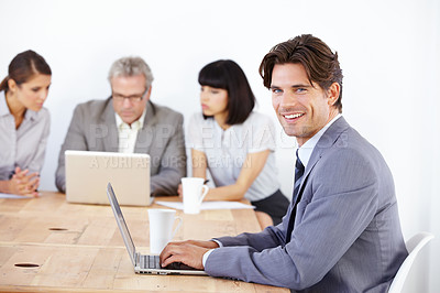 Buy stock photo Business man in portrait with laptop, leadership in meeting and corporate leader in conference room. Confident male typing notes with smile, presentation and technology with pride in workplace