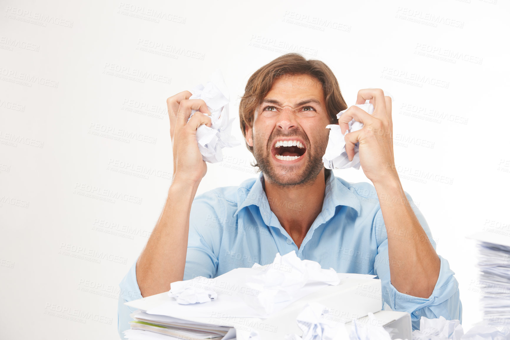 Buy stock photo Angry, stress and burnout in businessman with crumpled paper for brainstorming, thinking of bad ideas and strategy. Deadline, chaos and frustrated worker with mess of documents, paperwork and notes 