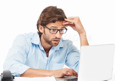 Buy stock photo Shock, surprise and businessman on a laptop working on a project with a deadline in a studio. Shocked, wow and professional male employee gasping while doing research on computer by white background.