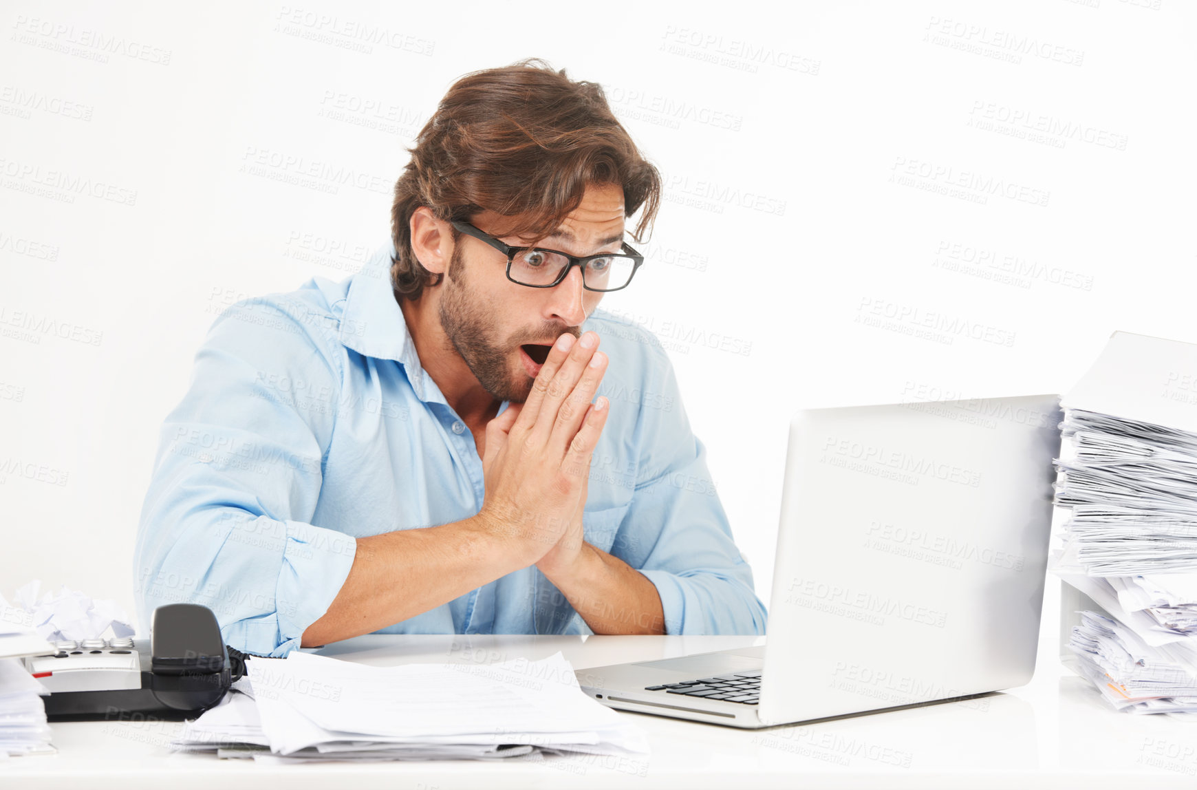 Buy stock photo Laptop, paperwork and shocked businessman working on a project with a deadline in a studio. Shock, surprise and professional male employee with a computer and corporate documents by white background.