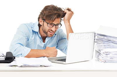 Buy stock photo Laptop, stress and documents with a business man frustrated in studio on a white background for work. Computer, paper and pulling hair with a male employee feeling overwhelmed while working online