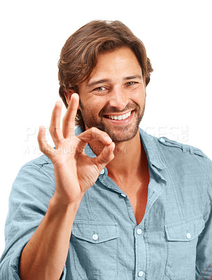 Buy stock photo Man smile in portrait with OK hand sign, agreement or good review, feedback and emoji against studio background. Yes gesture, success and happy vote with approval and male voice positive opinion 