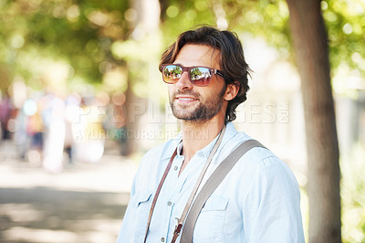 Buy stock photo Travel, sunglasses or happy man on holiday, vacation or weekend trip for a fun adventure in Italy. Relax, calm or tourist person with fashion, smile or freedom sightseeing in park, nature or journey