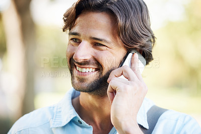 Buy stock photo Shot of a handsome young man in the park