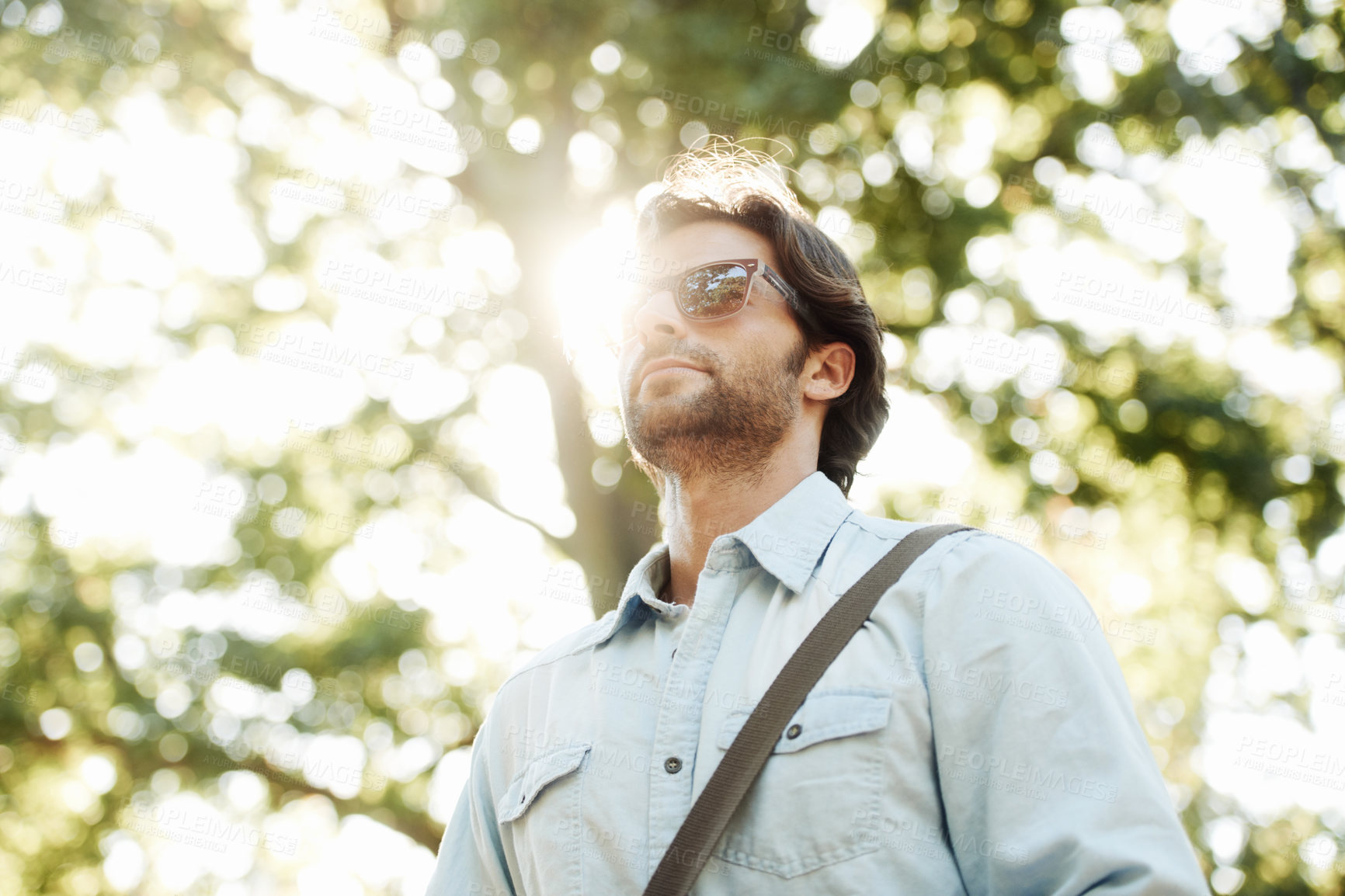 Buy stock photo Relax, sunglasses or man in park walking in summer for fresh air, holiday vacation or break in garden in Italy. Tourism, thinking or male person in nature or natural environment for travel 