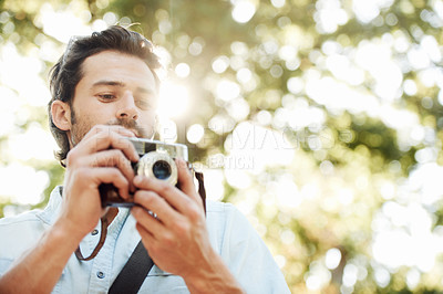 Buy stock photo Camera, photographer or man in park on holiday vacation trip for creativity, shooting or tourism memory. Photography, travel or male tourist with pictures for sightseeing or trees in nature in summer