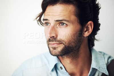 Buy stock photo Face, thinking and inspiration with a handsome man on a gray background with blank mockup space. Idea, mock up and beard with a male posing to promote advertising, marketing or product placement