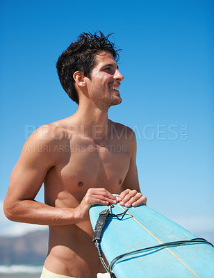 Buy stock photo Surfing, fitness and body happy man at a beach with surfboard for training, freedom or fun. Smile, adventure and male surfer at the sea for water sports, travel or vacation, holiday or summer hobby