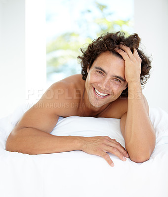 Buy stock photo Happy, portrait and a handsome man in bed for sleep, relaxing and content in the morning. Wake up, resting and a guy in the bedroom looking calm after sleeping, nap or rest in the comfort of a house