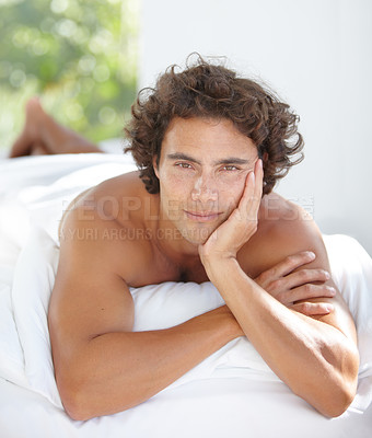 Buy stock photo Relax, portrait and a man in bed in the morning for rest, relaxation and content. Sexy, calm and a young guy lying in the bedroom with peace, stress relief and relaxing on the weekend at home