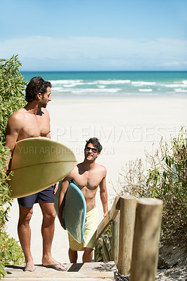 Buy stock photo Beach, fitness and men surfer friends at sea bonding, walking or having fun in nature. Ocean, sports and people with surfboard outdoor for training, freedom or summer vacation workout in South Africa