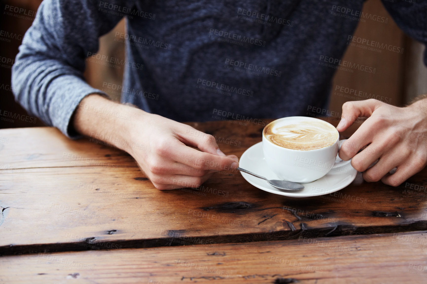 Buy stock photo Cropped image of male hands and a cup of coffee