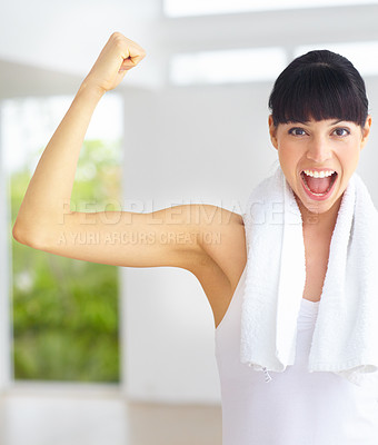 Buy stock photo Excited young woman pleased about reaching her fitness goals