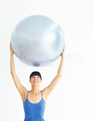 Buy stock photo Woman, exercise or ball with stretching for pilates, exercise or workout on muscle, posture and wellness. Person, arm or stretch for yoga, training or fitness with sportswear and technique in studio