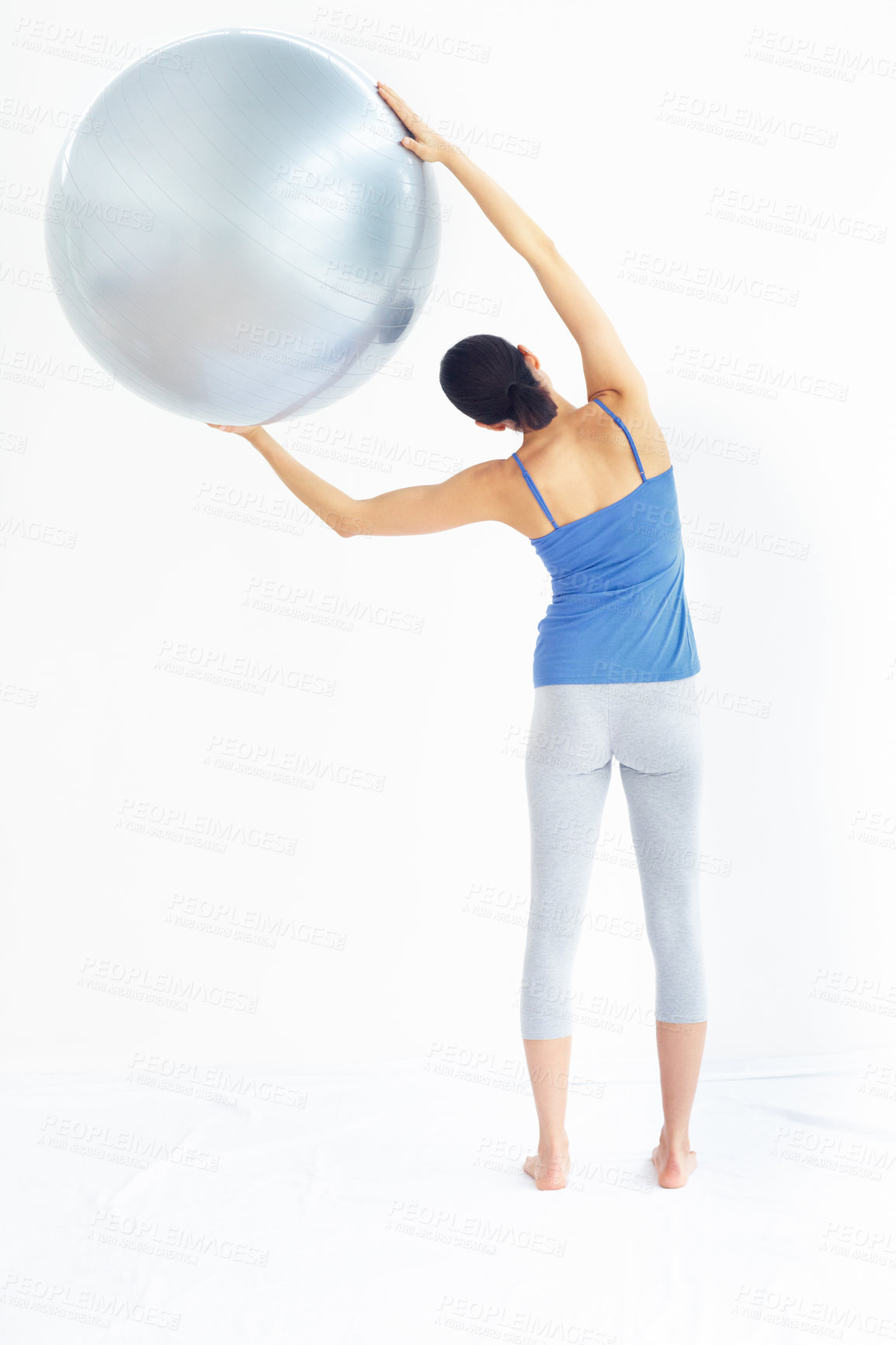 Buy stock photo Woman, exercise or ball with back for yoga, exercise or workout on muscle, posture and healthy body. Person, arm or stretching for pilates, training or fitness with sportswear and technique in studio