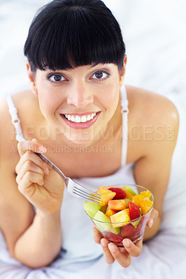 Buy stock photo Fruits salad, happiness and bedroom portrait of woman with natural organic meal, snack or morning breakfast for healthy lifestyle. Home apartment bed, face and nutritionist smile for vegan food mix