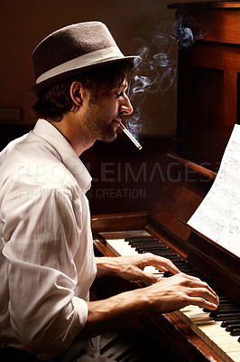 Buy stock photo Profile, piano and man with performance, smoking and entertainment with keyboard, jazz and creative. Person, artist and musician with cigarette, tobacco and ambient with smoke, pianist and instrument