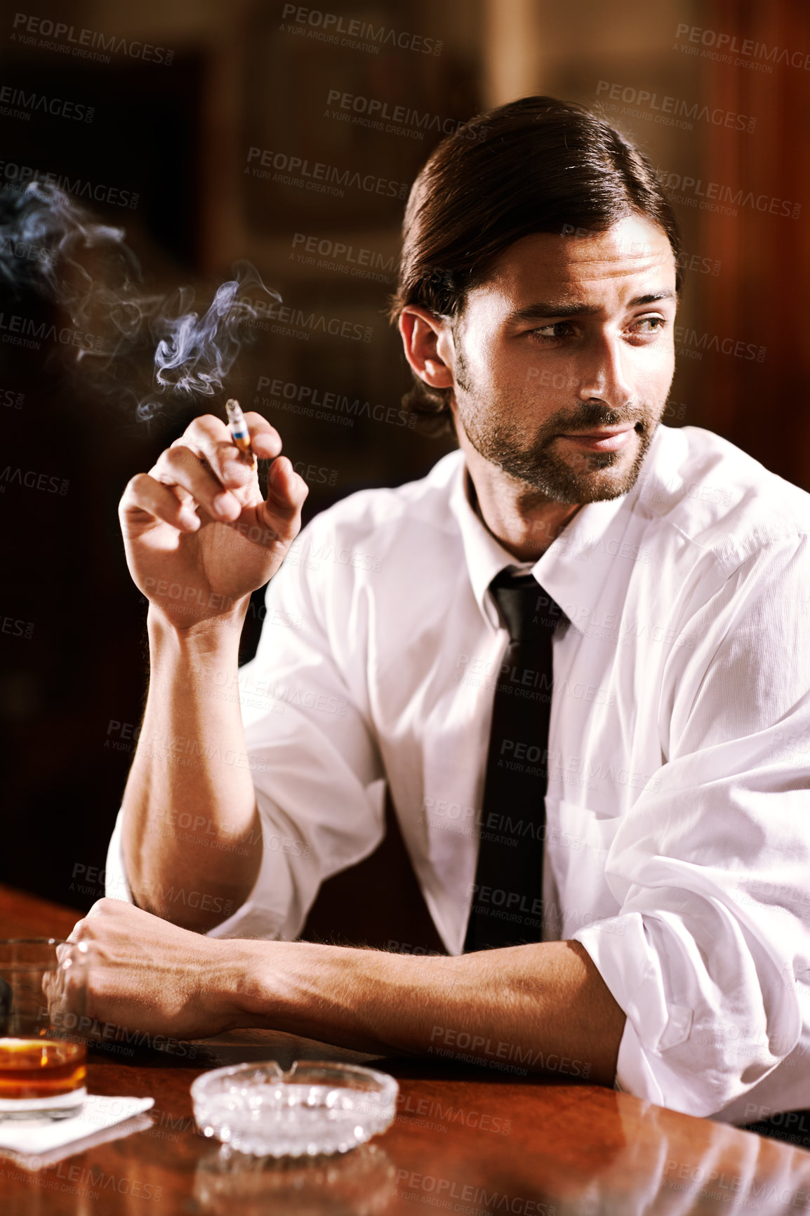 Buy stock photo Thinking, whiskey and man with a drink, smoking and vintage style with ideas, relax and cigarette. Person, gentleman or guy with tobacco, alcohol or smoker with beverage, tavern or fashion with event