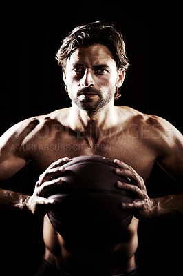 Buy stock photo Muscle, strong and portrait of man with basketball in studio isolated on black background. Sports, serious face and athlete with ball, body abs or workout, fitness or training to exercise for health