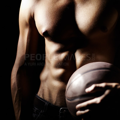 Buy stock photo Muscle, body and hands of athlete with basketball in studio isolated on a black background. Sports, closeup and strong man with ball, sexy abs and workout for fitness, training or exercise for health