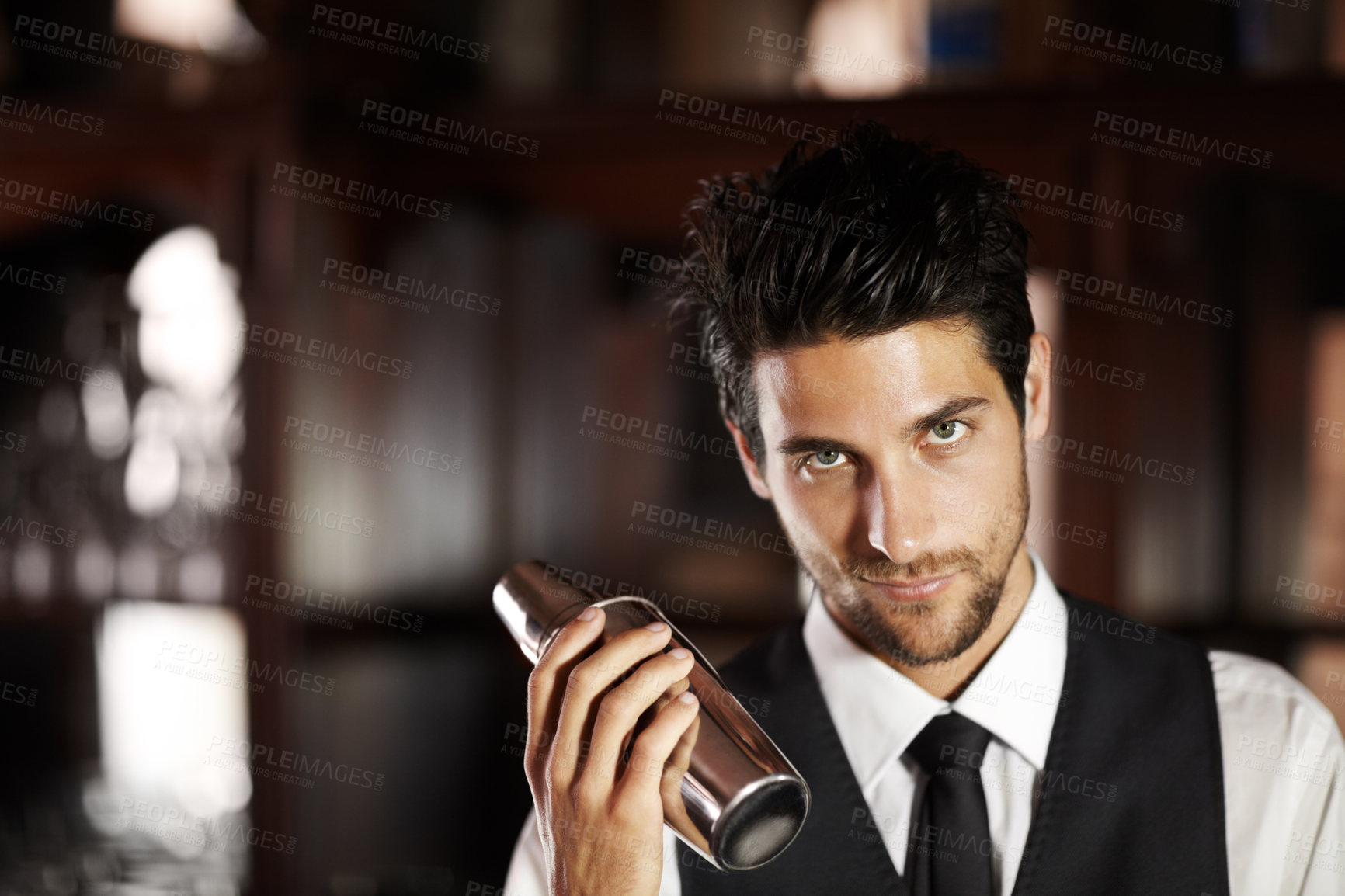 Buy stock photo Shake, cocktail and portrait of bartender with a drink for customer in dark club or night. Mixing, alcohol and face of barman with liquor in metal container or shaker for a strong beverage in a bar
