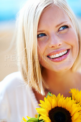 Buy stock photo Happy woman, face and thinking with flowers for summer break, eco friendly or vacation in nature. Closeup of female person smile in happiness with plant, outdoor or petal for season change outside