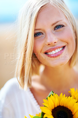 Buy stock photo Happy woman, face and portrait smile with flowers for summer break, eco friendly or vacation in nature. Closeup of female person in happiness with plant, outdoor or petal for season change outside