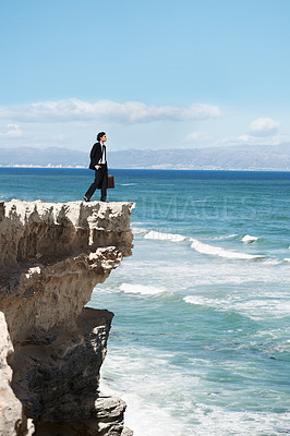 Buy stock photo Thinking, cliff and business man by ocean for freedom, opportunity and career in nature. Professional, mockup and corporate worker on rocks edge for work challenge, ideas and future with scenic view