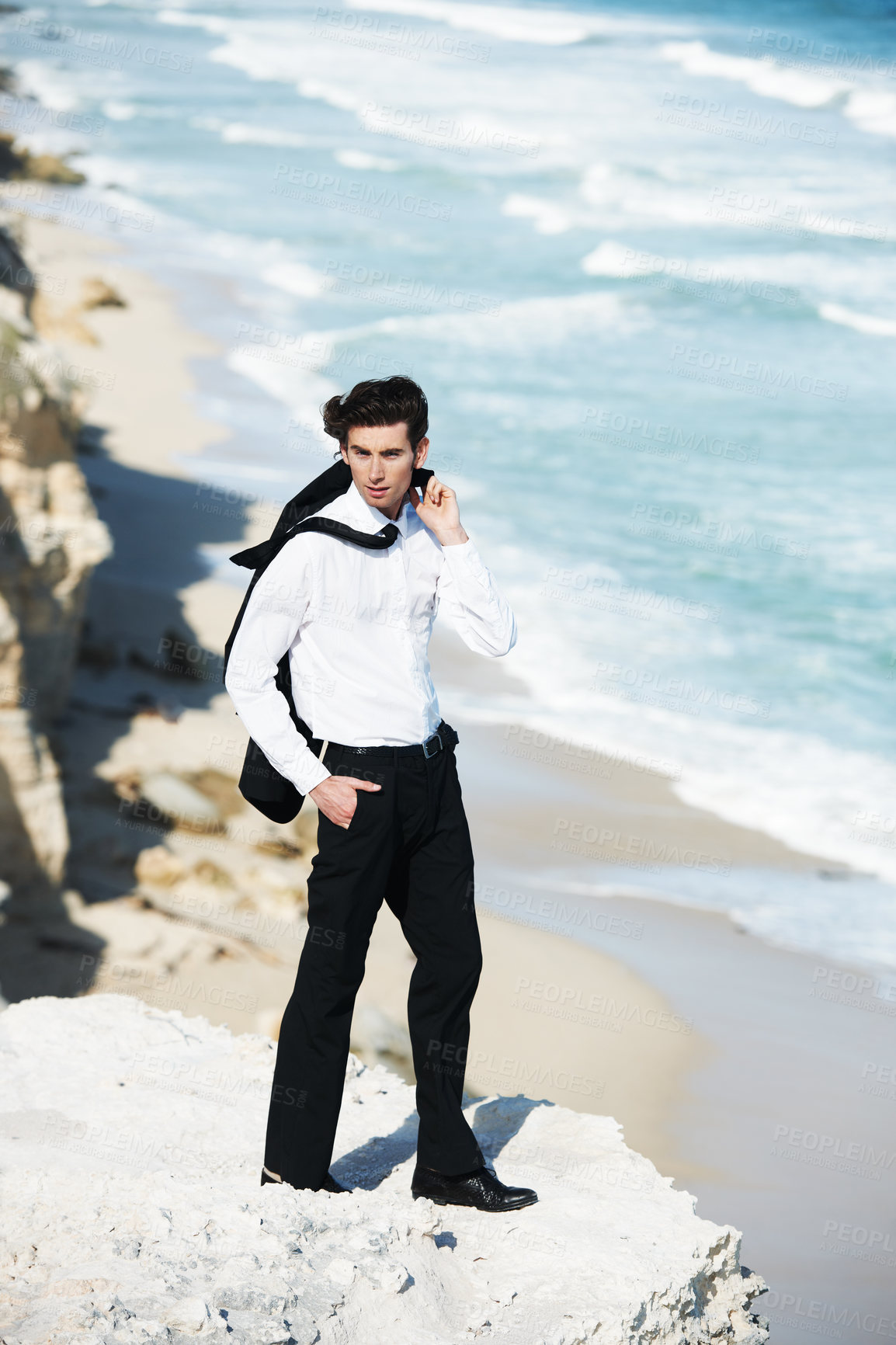 Buy stock photo Fashion, suit and business man by ocean for professional clothes, style and elegant outfit outdoors. Nature, corporate model and person on cliff with confidence, pride and formal clothing by seaside