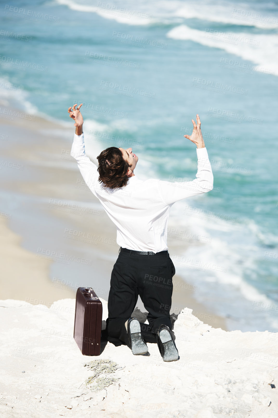 Buy stock photo Cliff, edge and business with man and stress for career, job opportunity or work deadline in ocean. Professional, briefcase or frustrated corporate worker on rock with anxiety, depression or crisis