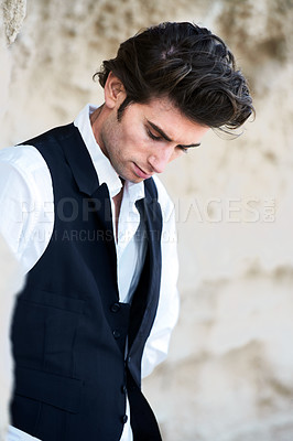 Buy stock photo Fashion, thinking and business man in nature for professional clothes, style and elegant outfit. Rocks, corporate model and person with confidence, pride and formal suit outdoors for aesthetic