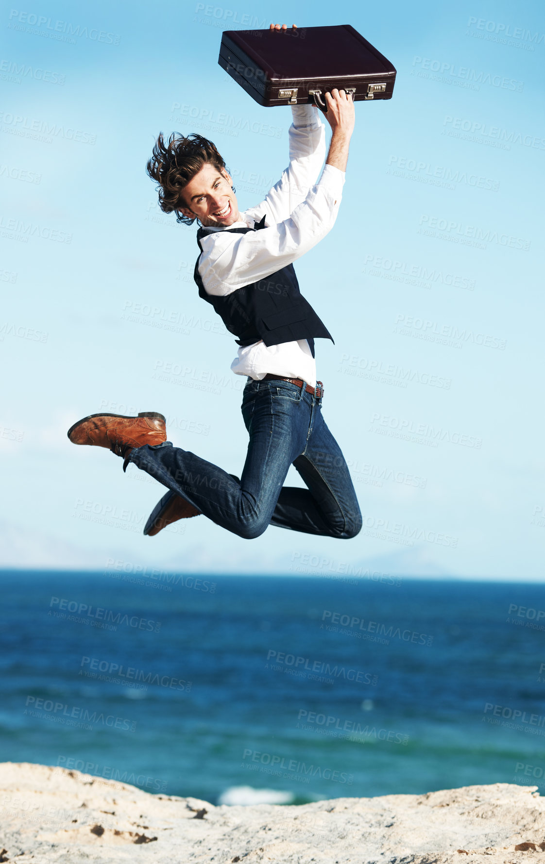 Buy stock photo Portrait, beach and jump with man, briefcase and excited with happiness, break and business. Person, employee and consultant with seaside background, ocean and action with celebration and vacation