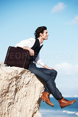 Buy stock photo Sitting, cliff and business man by ocean for freedom, holiday and vacation to relax in nature. Professional, mockup and happy worker thinking on mountain rocks for calm mindset, ideas and future